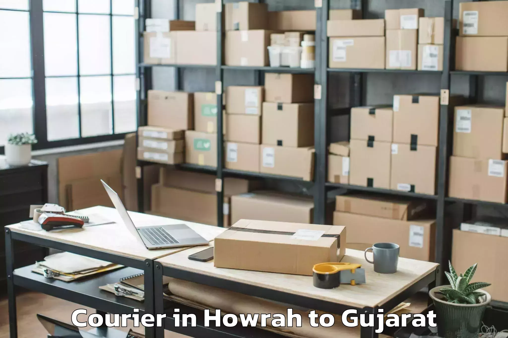 Book Your Howrah to Ambaji Courier Today